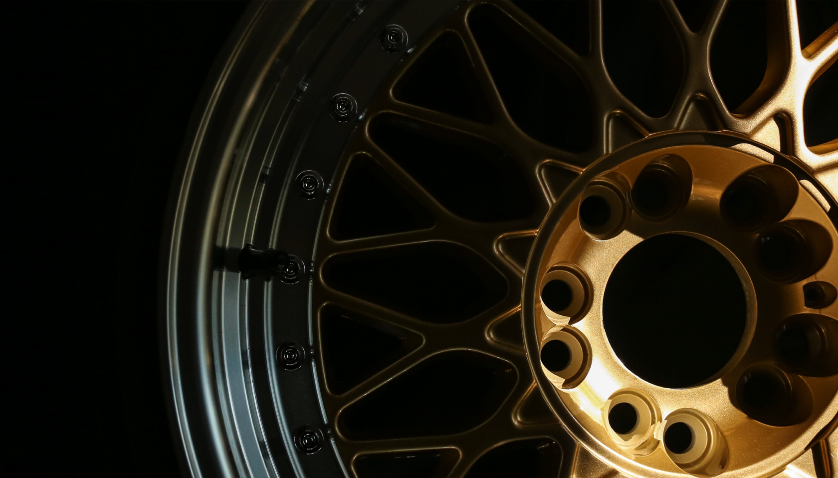 Close-up of a gold-painted alloy wheel